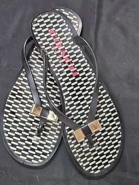 Coach Black Flip Flop Sandals with Gold Bow Accent